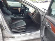 ✅ 2015 Cadillac CTS AWD • VIN: 1G6AW5SX3F0142431 • Lot: 43027413. Listed on IAAI with 125,276 mi. Free auction sales archive from the USA and detailed vehicle history report at DreamBid. Image 5.