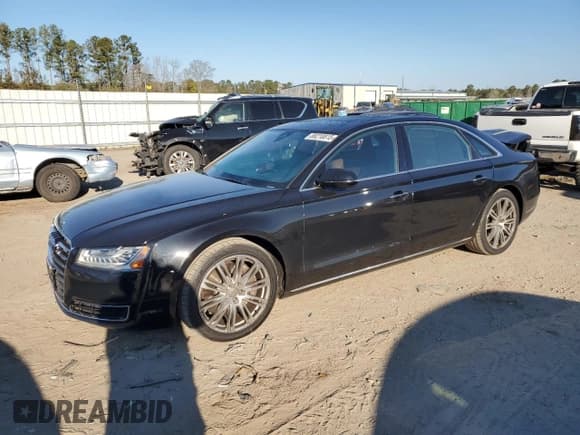 ✅ 2015 Audi A8 3.0T • VIN: WAU3GAFD1FN017875 • Lot: 88210815. Listed on Copart with 124,720 mi. Free auction sales archive from the USA and detailed vehicle history report at DreamBid. Image 1.