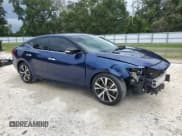 ✅ 2018 Nissan Maxima Platinum • VIN: 1N4AA6AP4JC375282 • Lot: 71619475. Wystawiony na Copart z przebiegiem 93 221 mil. Bezpłatny archiwum sprzedaży aukcyjnych z USA i szczegółowy raport historii pojazdu na DreamBid. Zdjęcie 4.