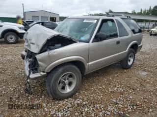 2002 Chevrolet Blazer LS z VIN 1GNCS18W92K112977, wystawiony jako Copart lot #58580545 z przebiegiem Nie podano mil oraz Szkoda całkowita • Salvage title. Historia ofert i sprzedaży dostępna na DreamBid. Obrazek 1.