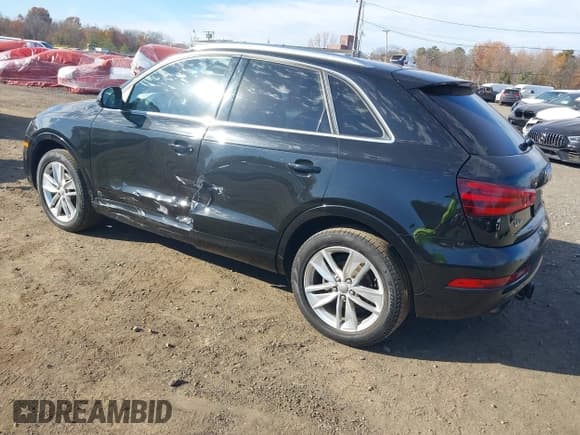 ✅ 2015 Audi Q3 Prestige • VIN: WA1GFCFS9FR004358 • Lot: 43604261. Listed on IAAI with 81,990 mi. Free auction sales archive from the USA and detailed vehicle history report at DreamBid. Image 3.