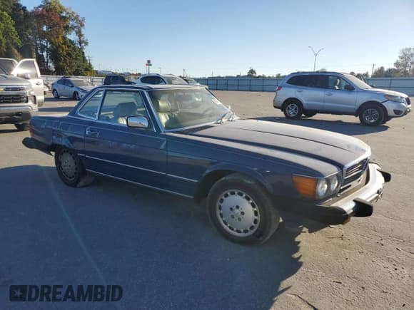 ✅ 1988 Mercedes-Benz 560 SL • VIN: WDBBA48D0JA082911 • Лот: 82742525. Опубликован ранее на Copart с пробегом 228 163 миль. Бесплатный доступ к архиву аукционных продаж из США и подробный отчёт об истории автомобиля на DreamBid. Изображение 4.