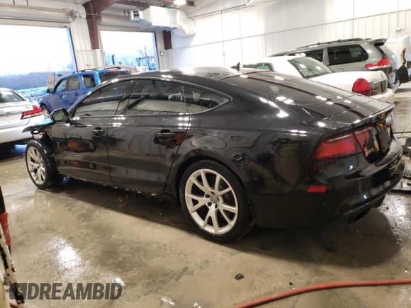 ✅ 2016 Audi RS 7 Prestige • VIN: WUAW2AFC0GN903129 • Lot: 41250974. Listed on Copart with 96,619 mi. Free auction sales archive from the USA and detailed vehicle history report at DreamBid. Image 2.
