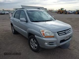 ✅ 2005 Kia Sportage LX • VIN: KNDJE723557070596 • Lot: 42008414. Listed on IAAI with 215,204 mi. Free auction sales archive from the USA and detailed vehicle history report at DreamBid. Image 1.