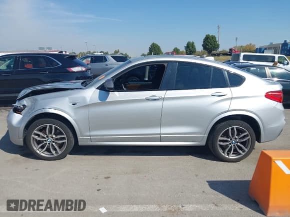 ✅ 2017 BMW X4 M40i • VIN: 5UXXW7C59H0U25949 • Лот: 43245359. Опубликован ранее на IAAI с пробегом 136 641 миль. Бесплатный доступ к архиву аукционных продаж из США и подробный отчёт об истории автомобиля на DreamBid. Изображение 14.