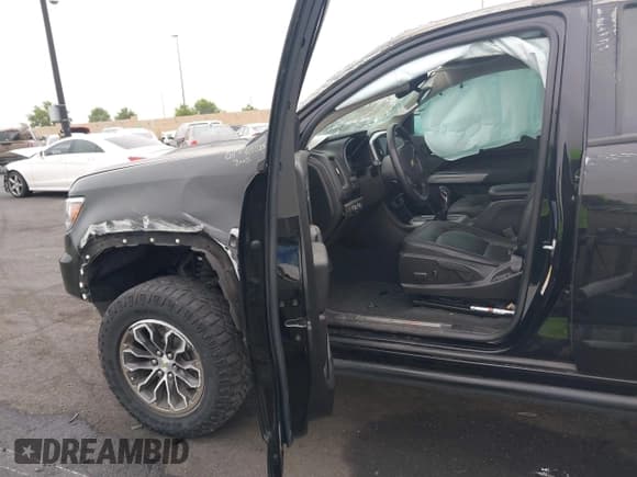 ✅ 2022 Chevrolet Colorado 4WD ZR2 • VIN: 1GCGTEEN0N1110426 • Lot: 42519944. Listed on IAAI with 41,261 mi. Free auction sales archive from the USA and detailed vehicle history report at DreamBid. Image 5.