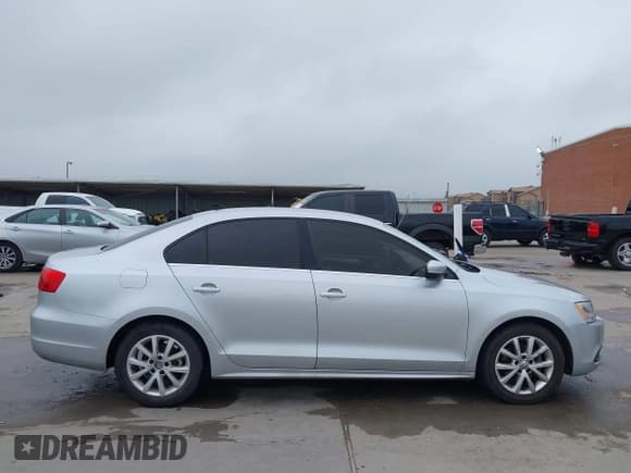 ✅ 2013 Volkswagen Jetta SE • VIN: 3VWDX7AJXDM373706 • Lot: 42161655. Listed on IAAI with 202,471 mi. Free auction sales archive from the USA and detailed vehicle history report at DreamBid. Image 13.