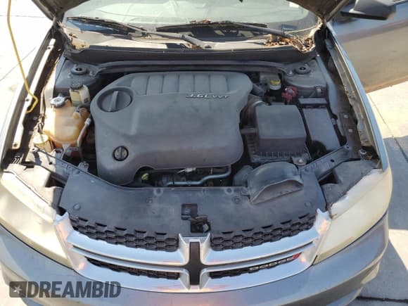 ✅ 2013 Dodge Avenger SE V6 • VIN: 1C3CDZAG8DN664402 • Lot: 75138254. Wystawiony na Copart z przebiegiem 98 907 mil. Bezpłatny archiwum sprzedaży aukcyjnych z USA i szczegółowy raport historii pojazdu na DreamBid. Zdjęcie 11.