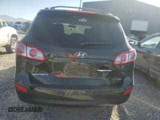 ✅ 2012 Hyundai Santa Fe Limited • VIN: 5XYZKDAG3CG110463 • Lot: 70720384. Listed on Copart with 123,928 mi. Free auction sales archive from the USA and detailed vehicle history report at DreamBid. Image 6.