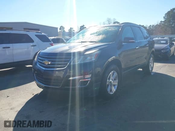 ✅ 2014 Chevrolet Traverse LT • VIN: 1GNKRHKD0EJ373612 • Lot: 43812609. Listed on IAAI with 161,104 mi. Free auction sales archive from the USA and detailed vehicle history report at DreamBid. Image 2.