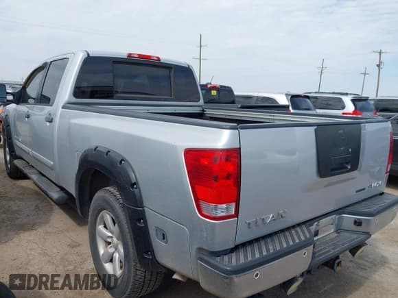 ✅ 2011 Nissan Titan • VIN: 1N6BA0FCXBN309162 • Lot: 42972161. Listed on IAAI with 336,992 mi. Free auction sales archive from the USA and detailed vehicle history report at DreamBid. Image 3.
