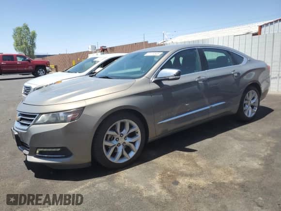 2019 Chevrolet Impala Premier z VIN 1G1105S35KU126237, wystawiony jako Copart lot #61374535 z przebiegiem 103 873 mil mil oraz Szkoda całkowita • Salvage title. Historia ofert i sprzedaży dostępna na DreamBid. Obrazek 1.