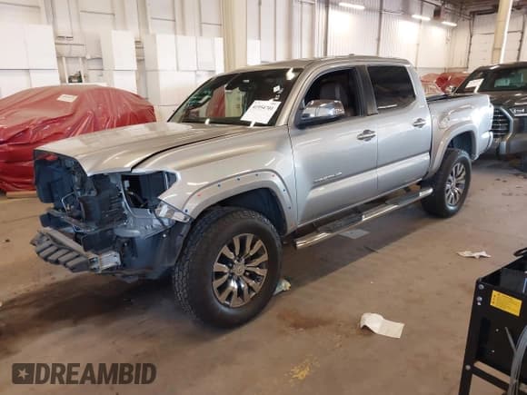 ✅ 2020 Toyota Tacoma Limited • VIN: 3TMGZ5AN0LM296991 • Лот: 41954701. Опубликован ранее на IAAI с пробегом 54 877 миль. Бесплатный доступ к архиву аукционных продаж из США и подробный отчёт об истории автомобиля на DreamBid. Изображение 21.