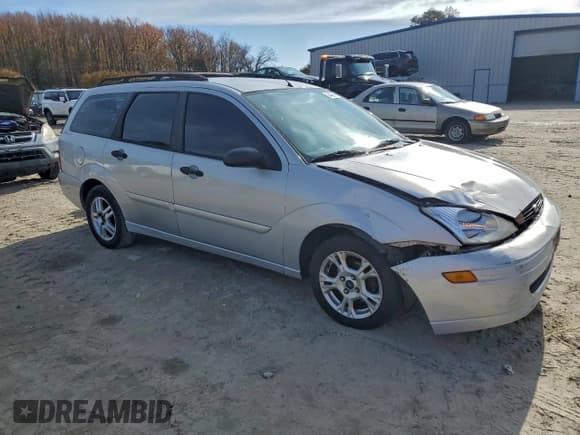 ✅ 2001 Ford Focus SE • VIN: 1FAHP36331W298095 • Lot: 94436855. Listed on Copart with 176,068 mi. Free auction sales archive from the USA and detailed vehicle history report at DreamBid. Image 4.