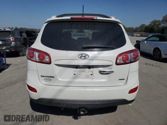✅ 2012 Hyundai Santa Fe Limited • VIN: 5XYZK4AG0CG144702 • Lot: 75204044. Listed on Copart with 173,296 mi. Free auction sales archive from the USA and detailed vehicle history report at DreamBid. Image 6.