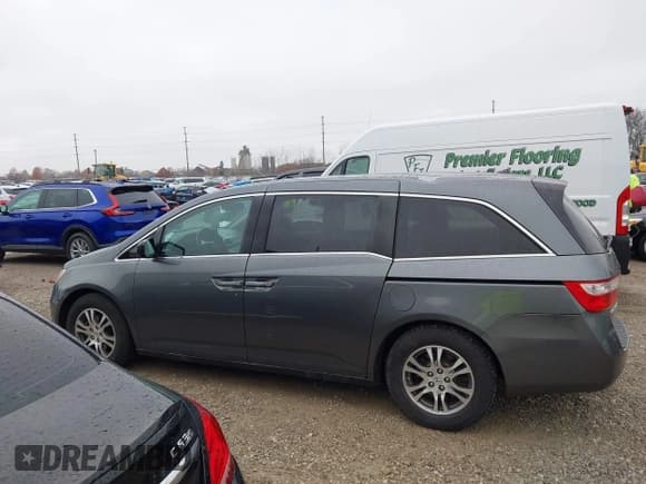 ✅ 2012 Honda Odyssey EX-L • VIN: 5FNRL5H68CB091707 • Lot: 43723624. Listed on IAAI with 184,495 mi. Free auction sales archive from the USA and detailed vehicle history report at DreamBid. Image 14.