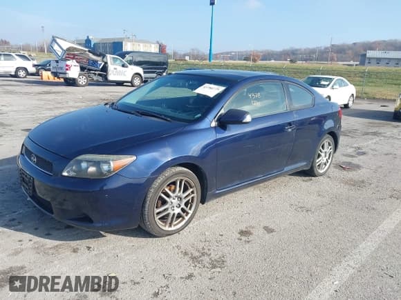 ✅ 2007 Scion tC • VIN: JTKDE167670196445 • Lot: 43780775. Listed on IAAI with 93,230 mi. Free auction sales archive from the USA and detailed vehicle history report at DreamBid. Image 2.
