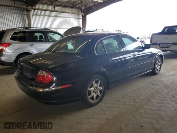 ✅ 2001 Jaguar S-Type V8 • VIN: SAJDA01DX1GL81947 • Лот: 59044625. Опубликован ранее на Copart с пробегом 84 140 миль. Бесплатный доступ к архиву аукционных продаж из США и подробный отчёт об истории автомобиля на DreamBid. Изображение 3.