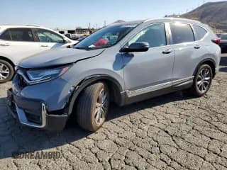 ✅ 2021 Honda CR-V Touring • VIN: 2HKRW1H9XMH402258 • Lot: 66647075. Listed on Copart with 76,860 mi. Free auction sales archive from the USA and detailed vehicle history report at DreamBid. Image 1.