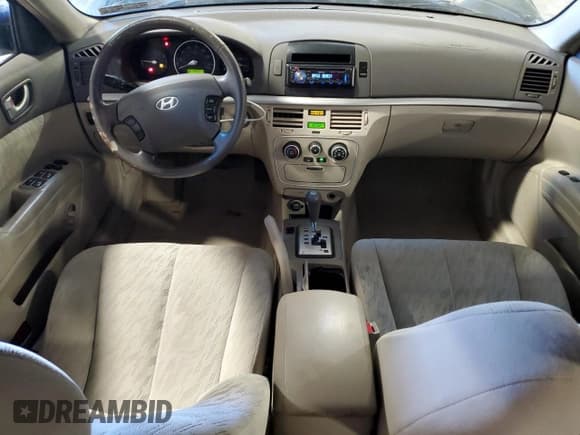 ✅ 2006 Hyundai Sonata GL • VIN: KMHET46C56A089469 • Лот: 77819934. Опубликован ранее на Copart с пробегом 128 108 миль. Бесплатный доступ к архиву аукционных продаж из США и подробный отчёт об истории автомобиля на DreamBid. Изображение 8.