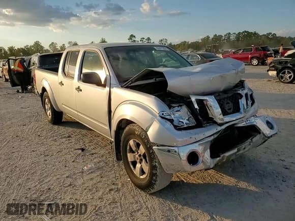 ✅ 2009 Nissan Frontier SE • VIN: 1N6AD09W29C400098 • Lot: 82475364. Listed on Copart with 100,442 mi. Free auction sales archive from the USA and detailed vehicle history report at DreamBid. Image 10.