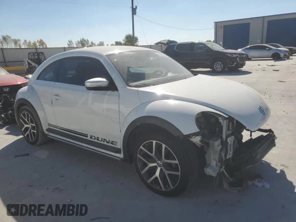 ✅ 2016 Volkswagen Beetle Dune • VIN: 3VWS17AT0GM633772 • Lot: 82483095. Listed on Copart with 73,990 mi. Free auction sales archive from the USA and detailed vehicle history report at DreamBid. Image 4.