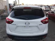 ✅ 2016 Mazda CX-5 Grand Touring • VIN: JM3KE2DY3G0863303 • Lot: 43848862. Wystawiony na IAAI z przebiegiem 95 498 mil. Bezpłatny archiwum sprzedaży aukcyjnych z USA i szczegółowy raport historii pojazdu na DreamBid. Zdjęcie 16.