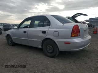 2005 Hyundai Accent GLS с VIN KMHCG45C25U604342, выставлен на аукционе Copart как лот 85380125 с пробегом 165 690 миль миль и Чистый • Clean title. История ставок и продаж доступна на DreamBid. Изображение 2.