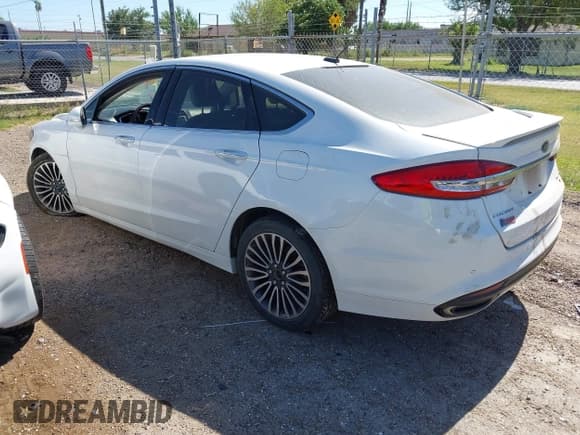 ✅ 2018 Ford Fusion Titanium • VIN: 3FA6P0D99JR124788 • Lot: 42789944. Listed on IAAI with 127,499 mi. Free auction sales archive from the USA and detailed vehicle history report at DreamBid. Image 3.