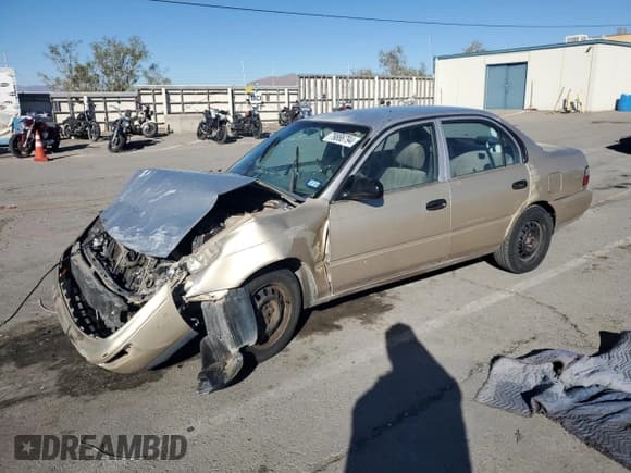 ✅ 1997 Toyota Corolla CE • VIN: 1NXBA02E9VZ613020 • Lot: 82120114. Listed on Copart with 223,147 mi. Free auction sales archive from the USA and detailed vehicle history report at DreamBid. Image 1.