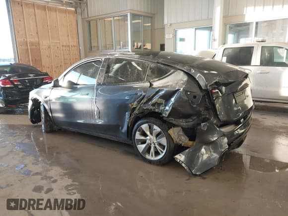 ✅ 2023 Tesla Model Y Long Range • VIN: 7SAYGDEE5PA033341 • Lot: 41379625. Listed on IAAI with Not provided. Free auction sales archive from the USA and detailed vehicle history report at DreamBid. Image 3.