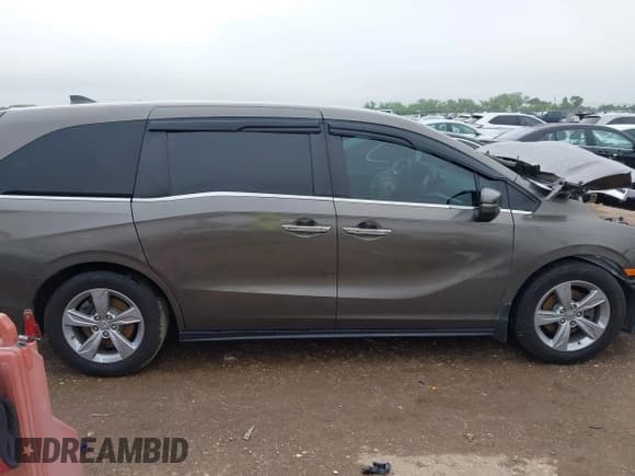 ✅ 2020 Honda Odyssey EX • VIN: 5FNRL6H50LB055717 • Lot: 42205465. Listed on IAAI with 104,719 mi. Free auction sales archive from the USA and detailed vehicle history report at DreamBid. Image 14.