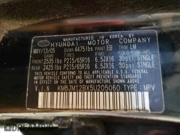 2005 Hyundai Tucson GL z VIN KM8JM12BX5U205060, wystawiony jako Copart lot #71282644 z przebiegiem 243 076 mil mil oraz Szkoda całkowita • Salvage title. Historia ofert i sprzedaży dostępna na DreamBid. Obrazek 16.