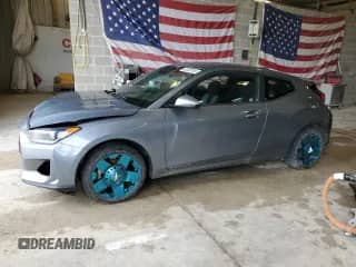 2019 Hyundai Veloster Premium z VIN KMHTG6AF5KU019911, wystawiony jako Copart lot #59309185 z przebiegiem 122 598 mil mil oraz Szkoda całkowita • Salvage title. Historia ofert i sprzedaży dostępna na DreamBid. Obrazek 1.