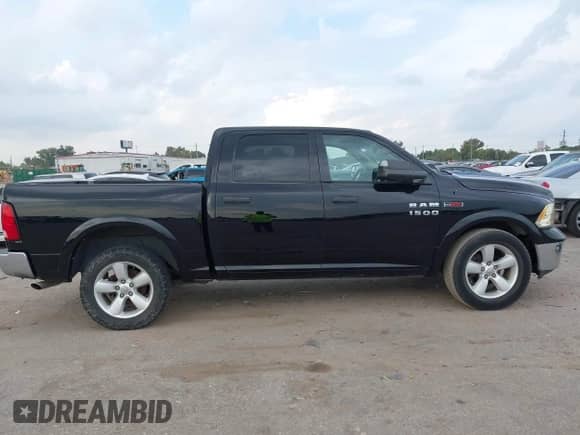 2014 Ram 1500 Big Horn with VIN 1C6RR7LM5ES385563, listed as a IAAI auction lot 43540358 with 184,258 mi miles and . Bid and sale history available at DreamBid. Image 13.