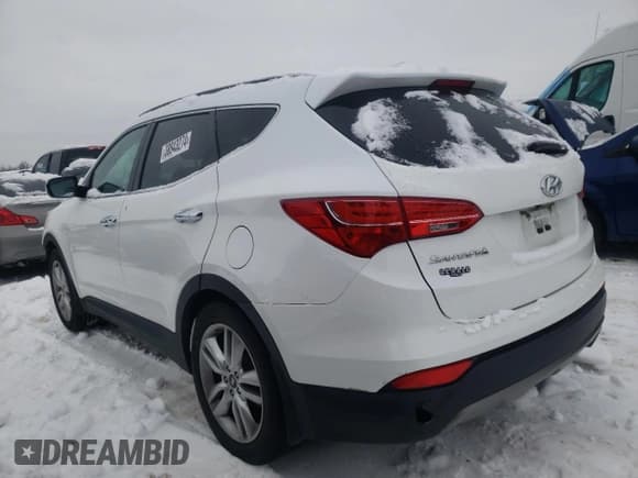 ✅ 2015 Hyundai Santa Fe • VIN: 5XYZW4LA9FG245951 • Лот: 38843274. Опубликован ранее на Copart с пробегом 143 884 миль. Бесплатный доступ к архиву аукционных продаж из США и подробный отчёт об истории автомобиля на DreamBid. Изображение 2.