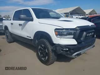 2022 Ram 1500 Rebel with VIN 1C6SRFLT4NN158883, listed as a IAAI auction lot 43517383 with 45,447 mi miles and . Bid and sale history available at DreamBid. Image 1.
