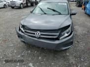 ✅ 2013 Volkswagen Tiguan S • VIN: WVGAV3AX6DW597379 • Лот: 56386515. Опубликован ранее на Copart с пробегом 100 415 миль. Бесплатный доступ к архиву аукционных продаж из США и подробный отчёт об истории автомобиля на DreamBid. Изображение 15.