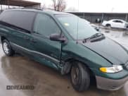 ✅ 1997 Plymouth Grand Voyager • VIN: 2P4GP44R5VR377345 • Lot: 41435749. Wystawiony na IAAI z przebiegiem 191 298 mil. Bezpłatny archiwum sprzedaży aukcyjnych z USA i szczegółowy raport historii pojazdu na DreamBid. Zdjęcie 6.