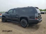 ✅ 2011 Chevrolet Suburban LS • VIN: 1GNSKHE32BR107058 • Lot: 60707125. Listed on Copart with 153,407 mi. Free auction sales archive from the USA and detailed vehicle history report at DreamBid. Image 2.