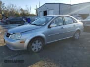 ✅ 2007 Suzuki Forenza • VIN: KL5JD56Z87K640876 • Лот: 45786805. Опубликован ранее на Copart с пробегом 243 916 миль. Бесплатный доступ к архиву аукционных продаж из США и подробный отчёт об истории автомобиля на DreamBid. Изображение 1.