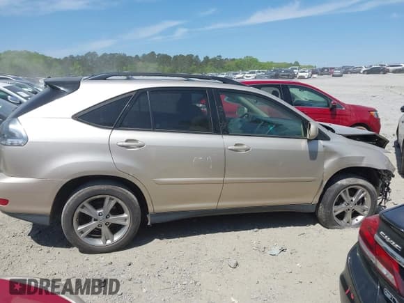 ✅ 2006 Lexus RX 400h • VIN: JTJGW31U160004161 • Лот: 42037974. Опубликован ранее на IAAI с пробегом 209 105 миль. Бесплатный доступ к архиву аукционных продаж из США и подробный отчёт об истории автомобиля на DreamBid. Изображение 13.