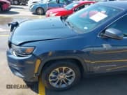 ✅ 2019 Jeep Cherokee Latitude Plus • VIN: 1C4PJLLX9KD469704 • Lot: 42257879. Listed on IAAI with 90,917 mi. Free auction sales archive from the USA and detailed vehicle history report at DreamBid. Image 18.