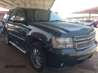 2011 Chevrolet Tahoe LTZ with VIN 1GNSCCE01BR320637, listed as a IAAI auction lot 42633070 with 171,605 mi miles and . Bid and sale history available at DreamBid. Image 1.