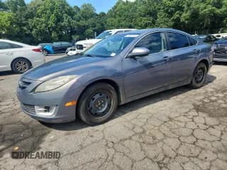 ✅ 2010 Mazda 6 i Sport • VIN: 1YVHZ8BH1A5M00965 • Lot: 67067415. Listed on Copart with 197,068 mi. Free auction sales archive from the USA and detailed vehicle history report at DreamBid. Image 1.