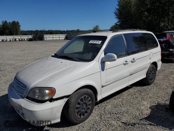 ✅ 2002 Kia Sedona LX • VIN: KNDUP131126201882 • Lot: 69361814. Listed on Copart with Not provided. Free auction sales archive from the USA and detailed vehicle history report at DreamBid. Image 1.