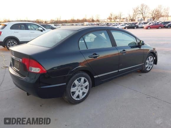 ✅ 2010 Honda Civic LX • VIN: 19XFA1F57AE062245 • Lot: 43718573. Listed on IAAI with 162,595 mi. Free auction sales archive from the USA and detailed vehicle history report at DreamBid. Image 4.