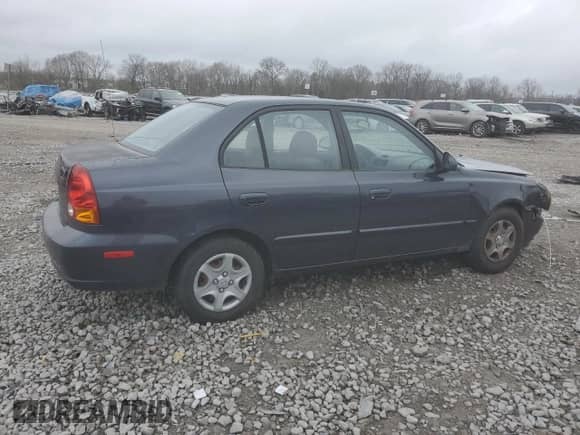 2005 Hyundai Accent GLS с VIN KMHCG45C85U671205, выставлен на аукционе Copart как лот 44362455 с пробегом 93 032 миль миль и Списание • Salvage title. История ставок и продаж доступна на DreamBid. Изображение 3.