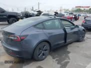✅ 2023 Tesla Model 3 • VIN: 5YJ3E1EA5PF400492 • Lot: 41728524. Wystawiony na IAAI z przebiegiem 33 830 mil. Bezpłatny archiwum sprzedaży aukcyjnych z USA i szczegółowy raport historii pojazdu na DreamBid. Zdjęcie 4.