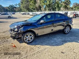 ✅ 2013 Mazda 3 i Touring • VIN: JM1BL1V72D1804828 • Лот: 94748395. Опубликован ранее на Copart с пробегом 129 745 миль. Бесплатный доступ к архиву аукционных продаж из США и подробный отчёт об истории автомобиля на DreamBid. Изображение 1.